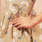 Pariari Girls Sleeveless Beige Heart & Bubble Bow Frock