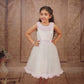 Pariari Girls Ivory Tulle Dress with Pink Blossom Neckline and Ruffle Charm