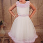 Pariari Girls Ivory Tulle Dress with Pink Blossom Neckline and Ruffle Charm